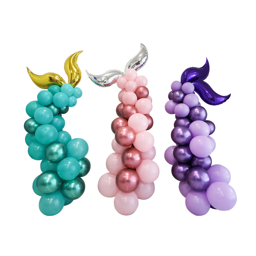 Three mermaid tail balloon garlands in pink, turquoise and purple. 